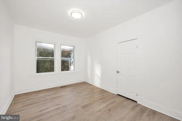 a view of a hallway view with staircase
