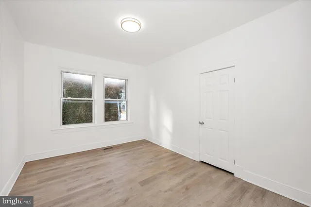 a view of a hallway view with staircase