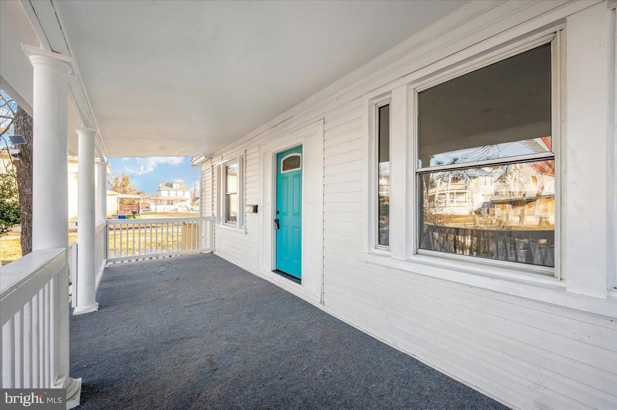 3503 Garrison Boulevard Baltimore, MD 21215 - Photo 3 of 68 a view of an empty room with a window