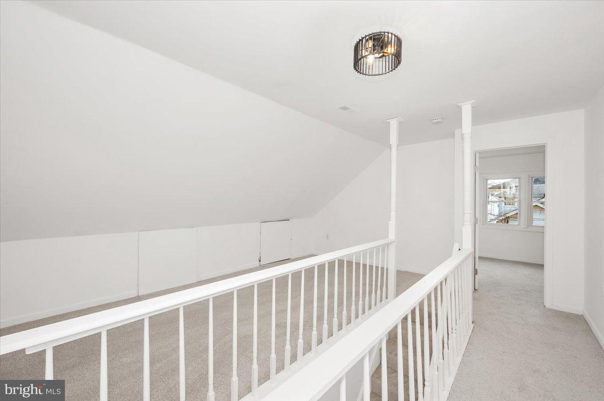 3503 Garrison Boulevard Baltimore, MD 21215 - Photo 32 of 68 a view of a hallway view with staircase