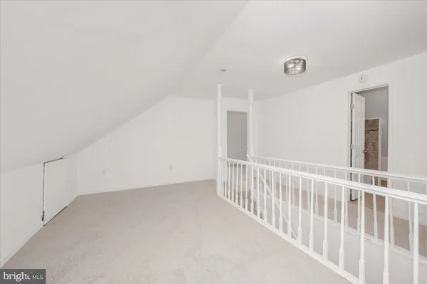 a view of room with racks on the wall