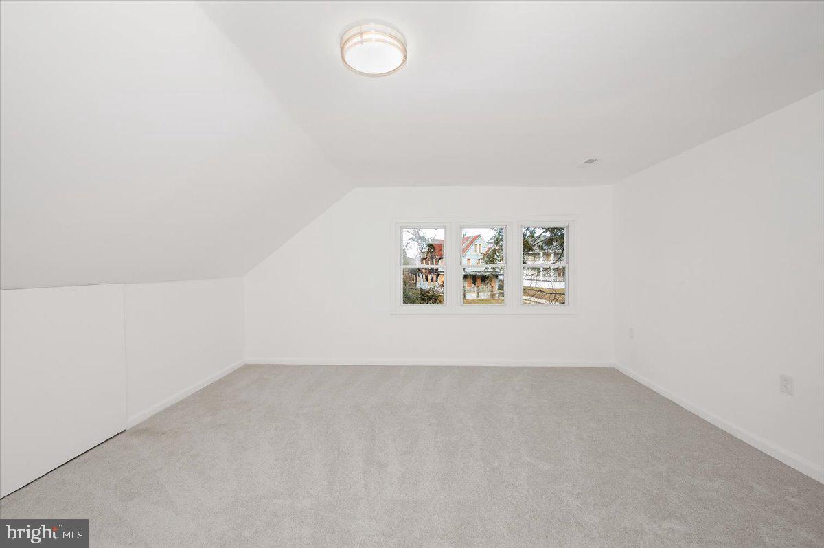 3503 Garrison Boulevard Baltimore, MD 21215 - Photo 40 of 68 a view of room with racks on the wall