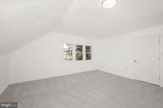 a view of a room with an empty space