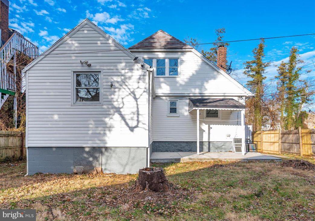 3503 Garrison Boulevard Baltimore, MD 21215 - Photo 51 of 68 a front view of a house with a yard