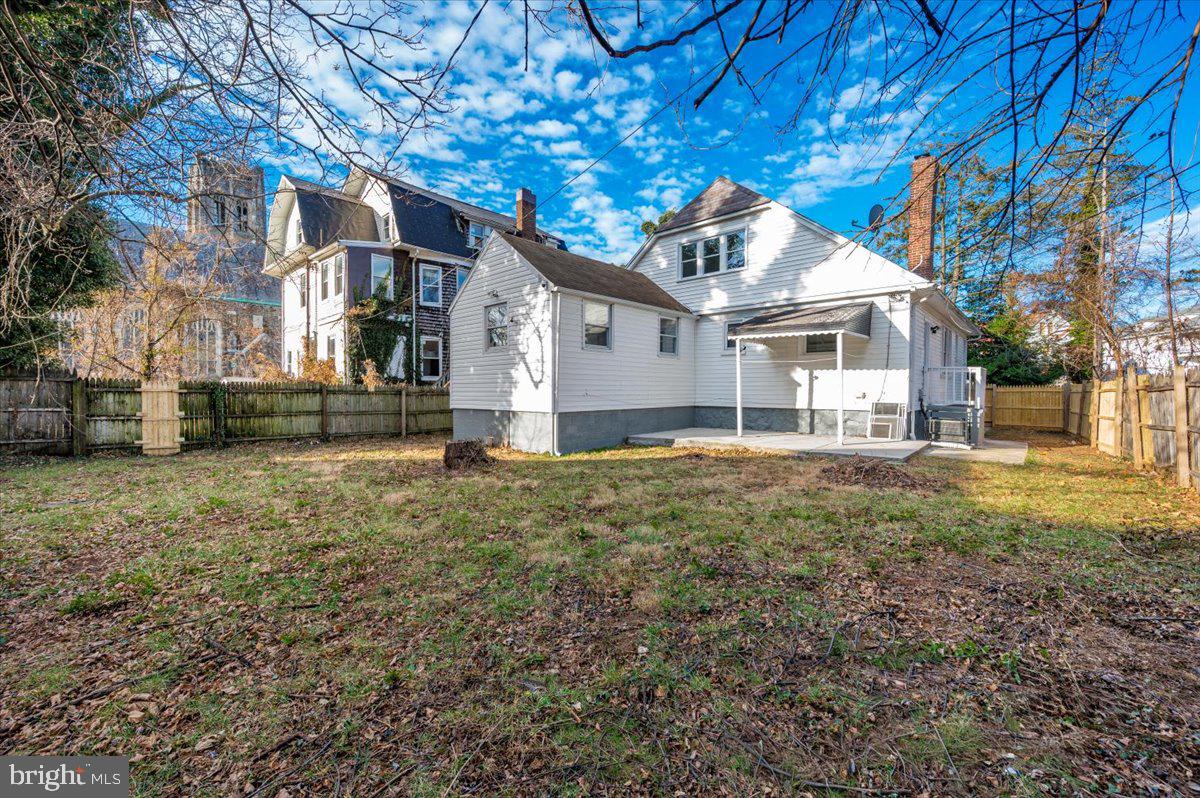 3503 Garrison Boulevard Baltimore, MD 21215 - Photo 57 of 68 a view of a house with a yard