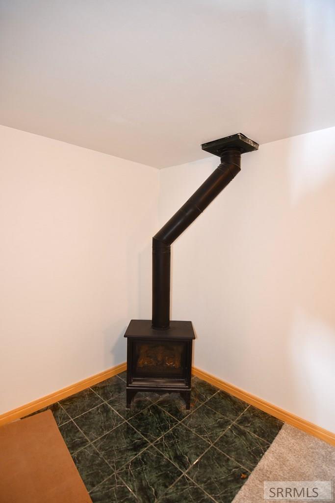 2950 North Ammon Road Idaho Falls, ID 83401 - Photo 24 of 48 Basement Fireplace