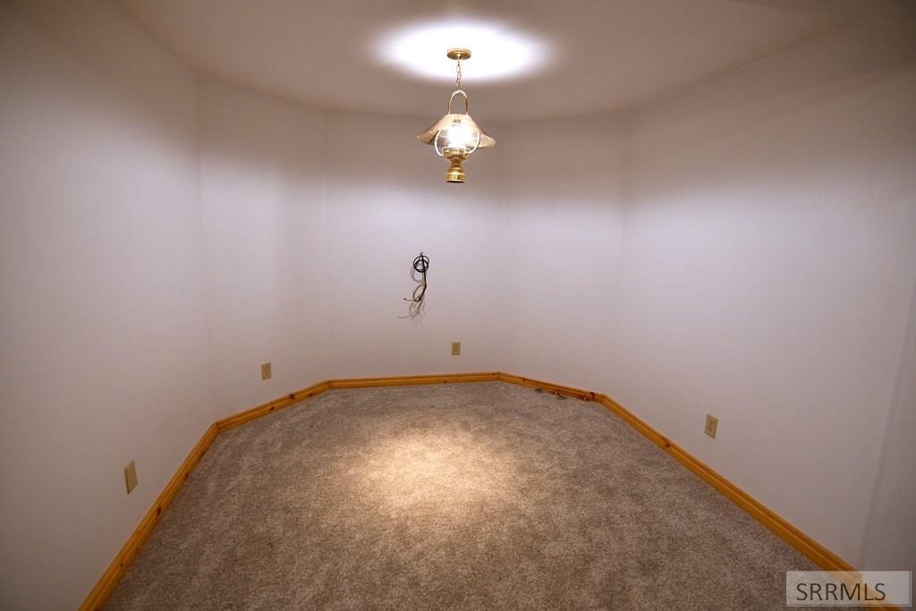 2950 North Ammon Road Idaho Falls, ID 83401 - Photo 26 of 48 Basement Family Room Game Area
