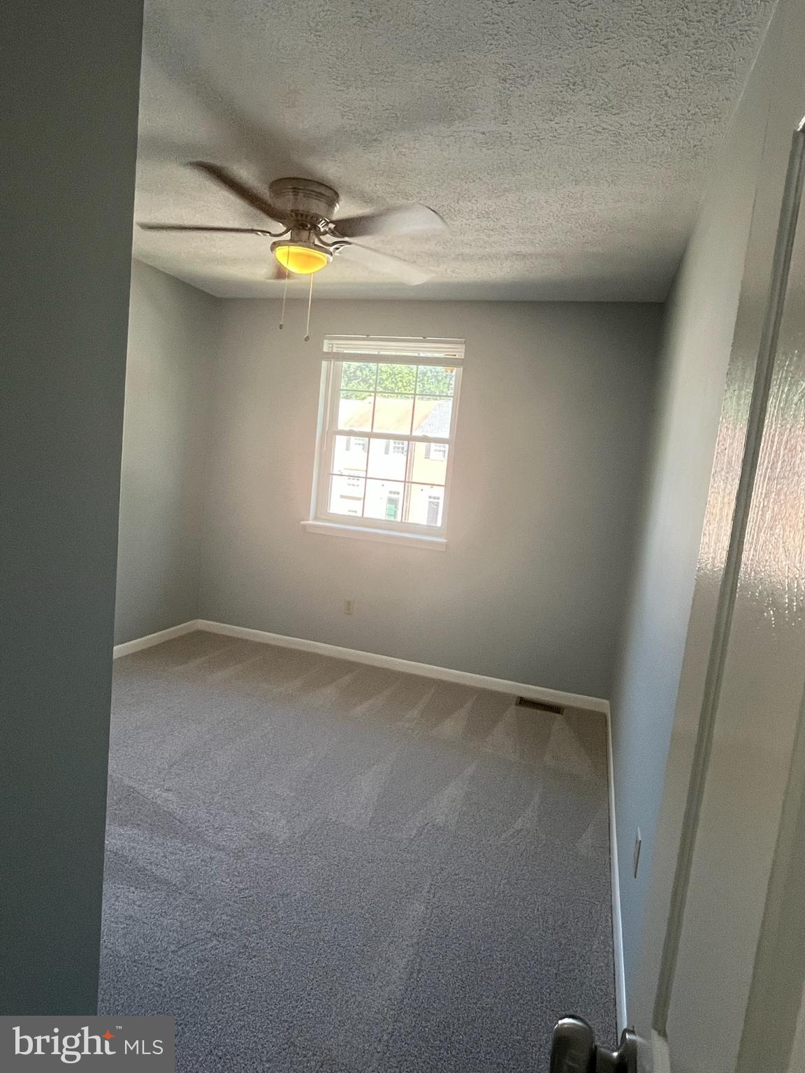 8523 Pine Run Court Ellicott City, MD 21043 - Photo 15 of 18 a view of an empty room with a window