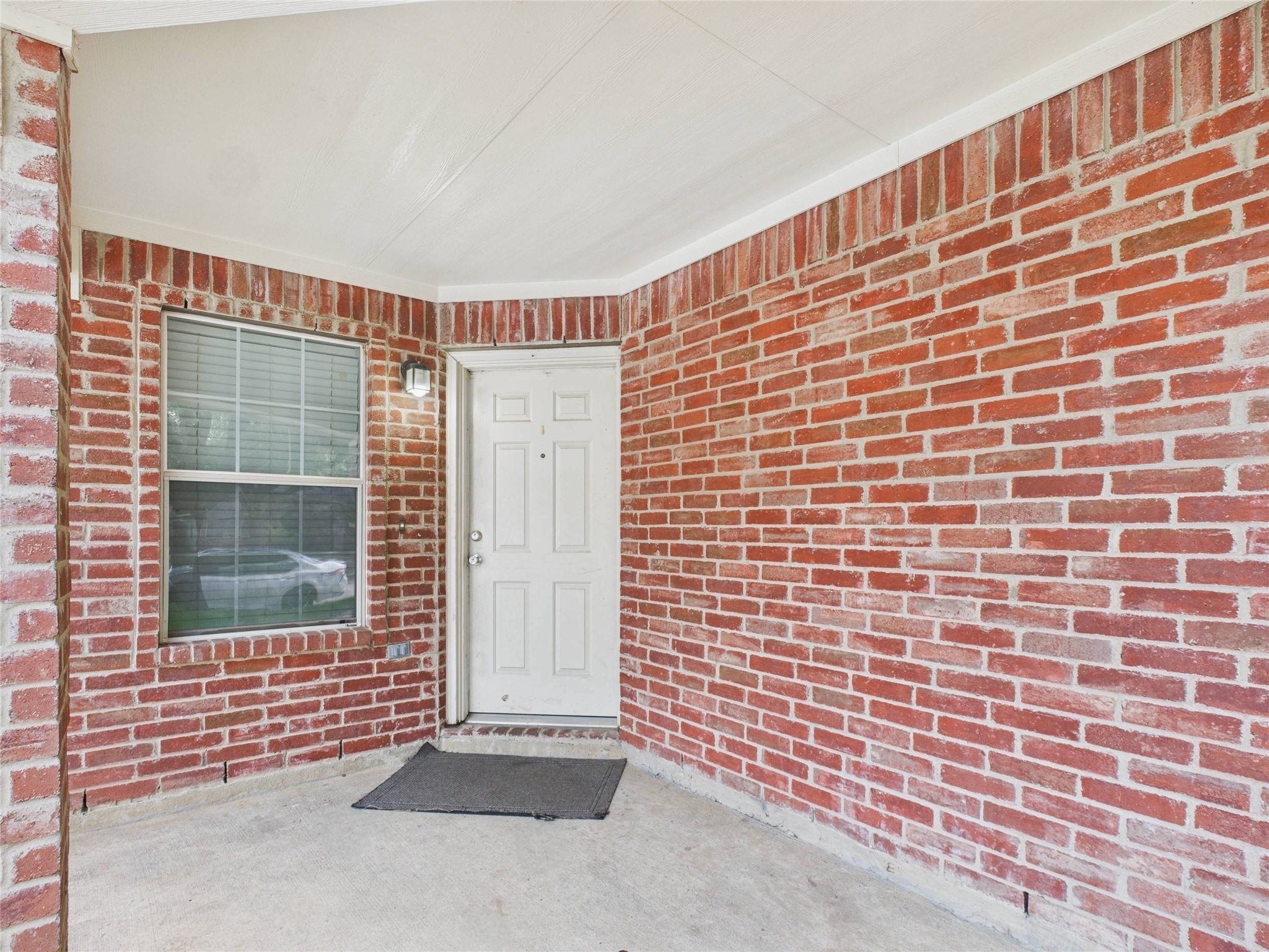 6618 Portlick Drive Katy, TX 77449 - Photo 27 of 40 Welcoming covered entry with brick accents.