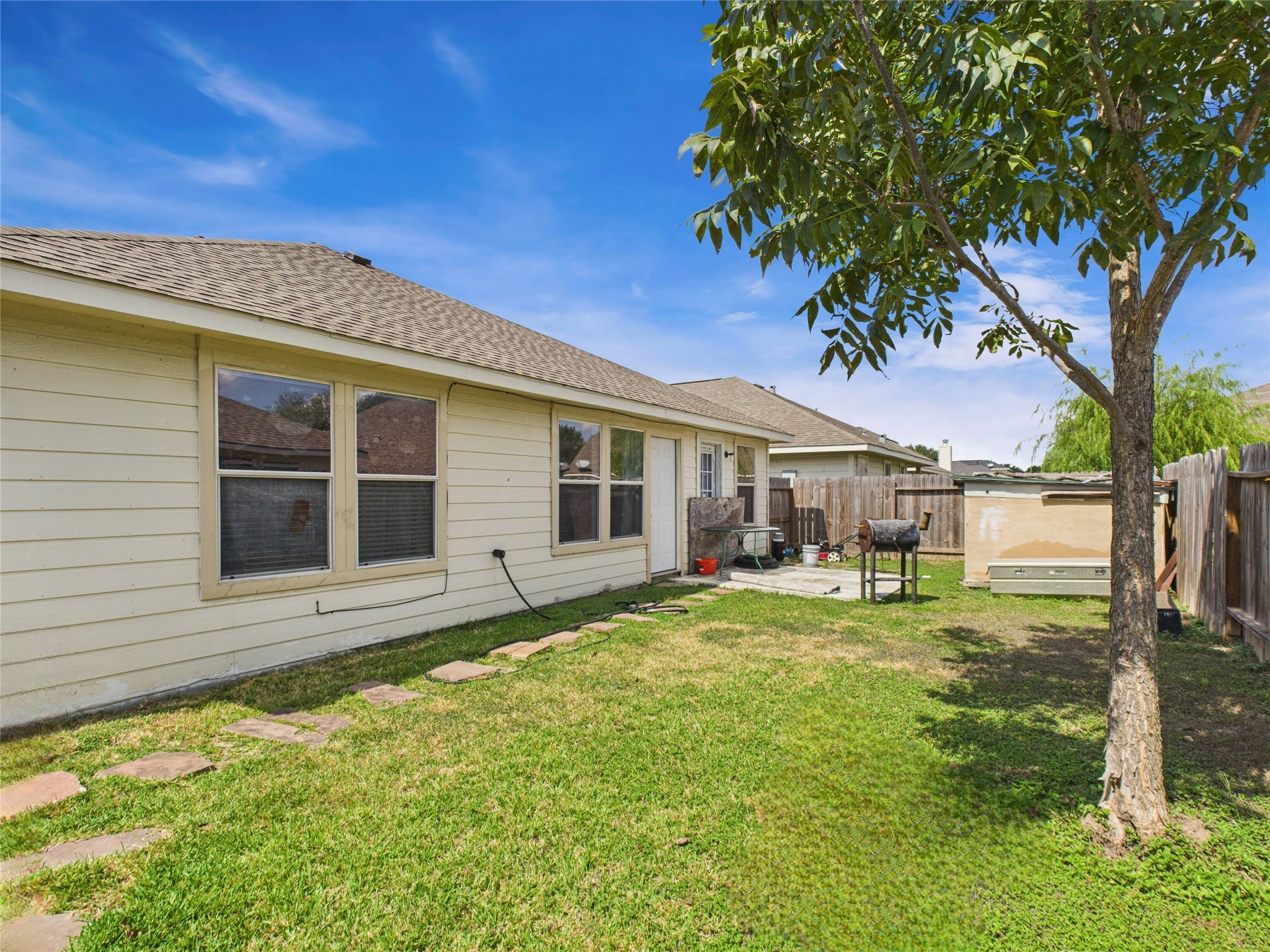 6618 Portlick Drive Katy, TX 77449 - Photo 29 of 40 Ample yard space with patio area and exterior access to living areas.