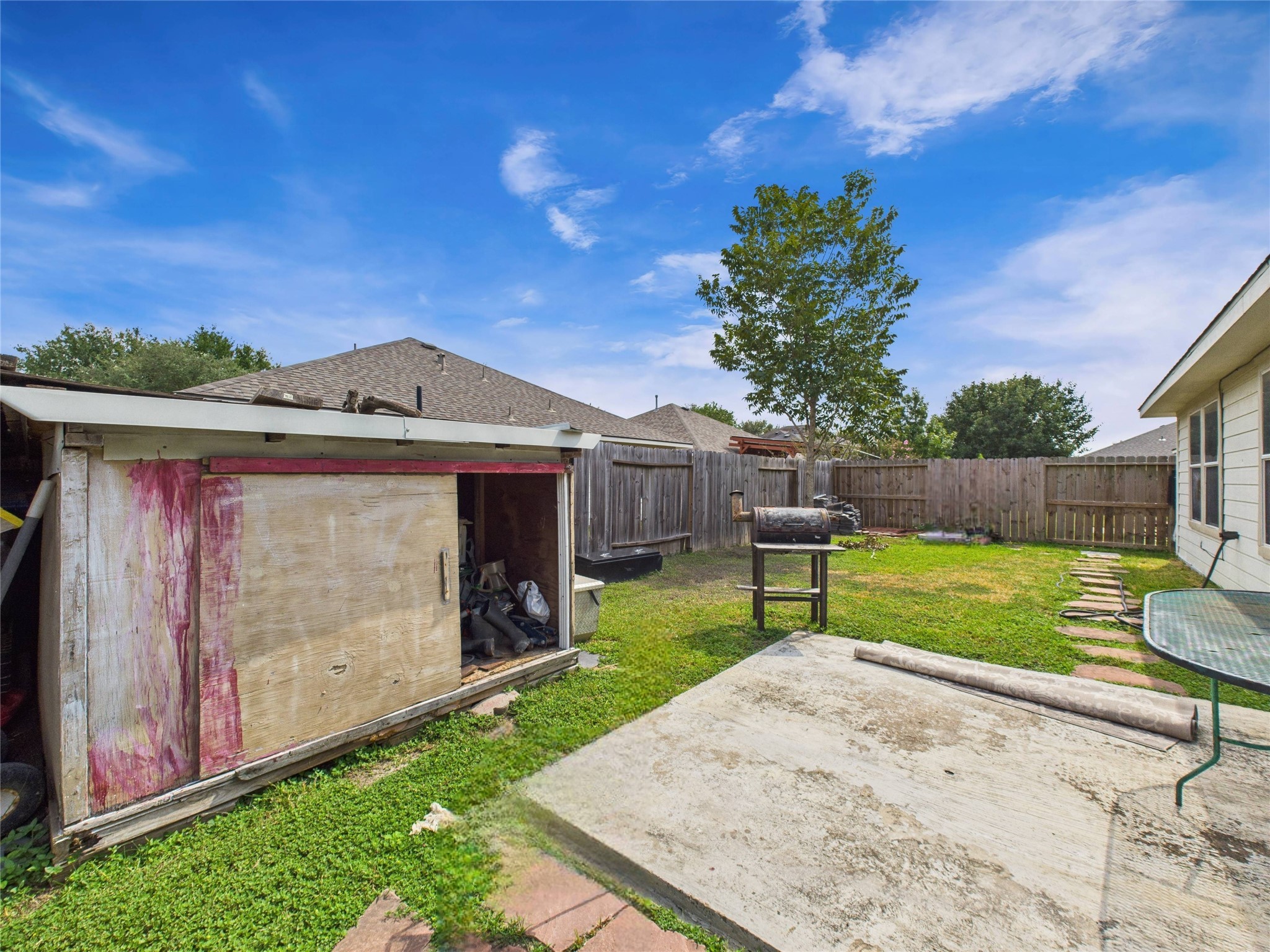 6618 Portlick Drive Katy, TX 77449 - Photo 32 of 40 Backyard includes additional storage shed and patio area.