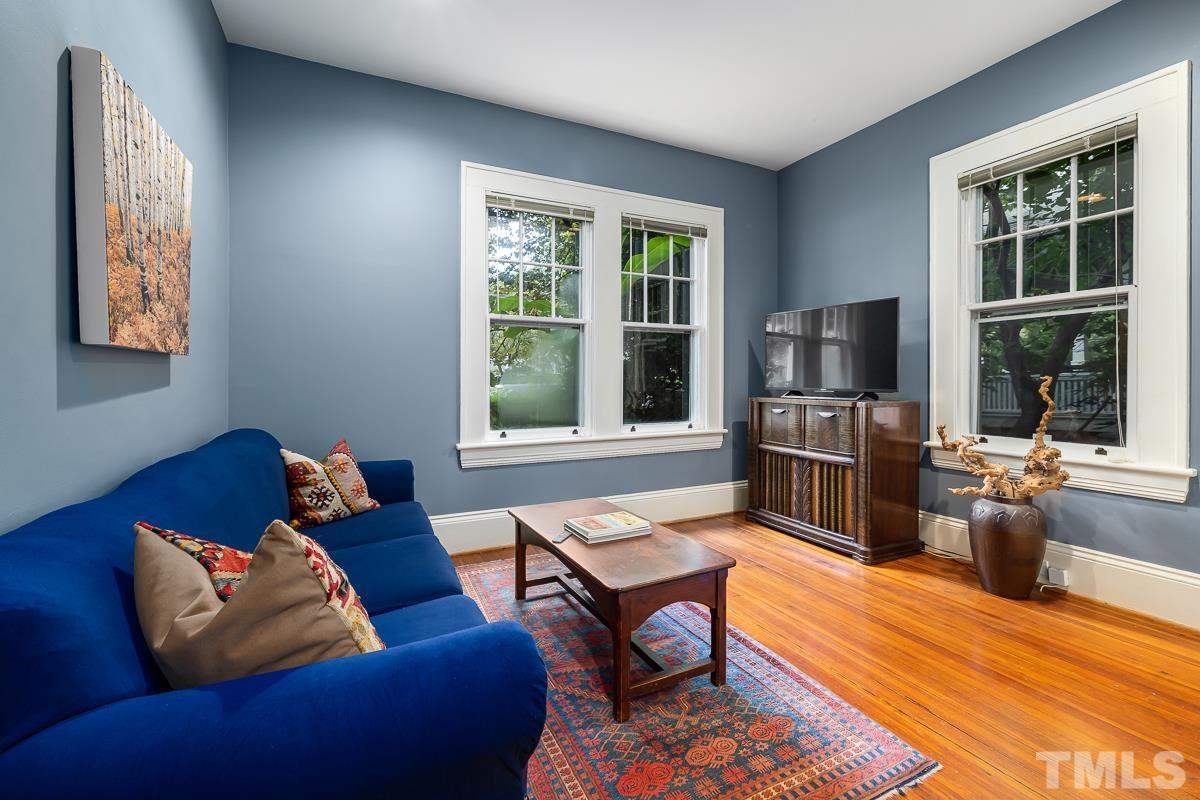 611 North Boundary Street Raleigh, NC 27604 - Photo 16 of 35 a living room with furniture fireplace and a window