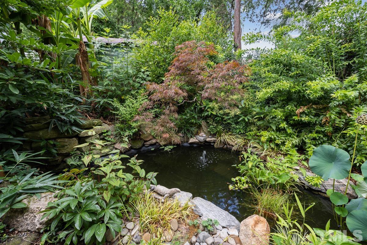 611 North Boundary Street Raleigh, NC 27604 - Photo 27 of 35 a view of a lake with a house