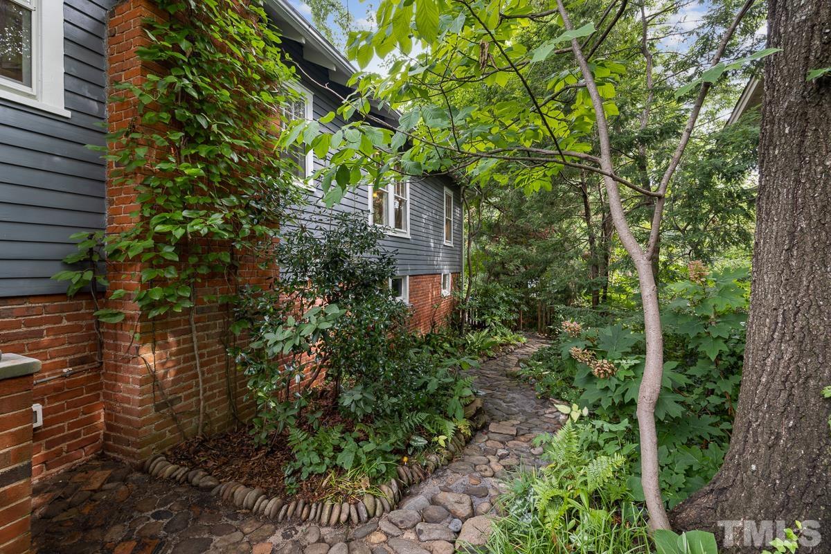 611 North Boundary Street Raleigh, NC 27604 - Photo 29 of 35 a view of a house with a tree