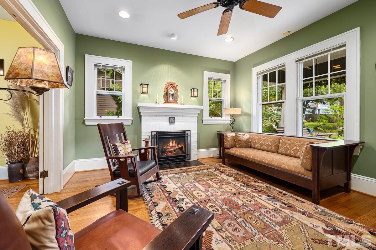 611 North Boundary Street Raleigh, NC 27604 - Photo 5 of 35 a living room with furniture and a fireplace