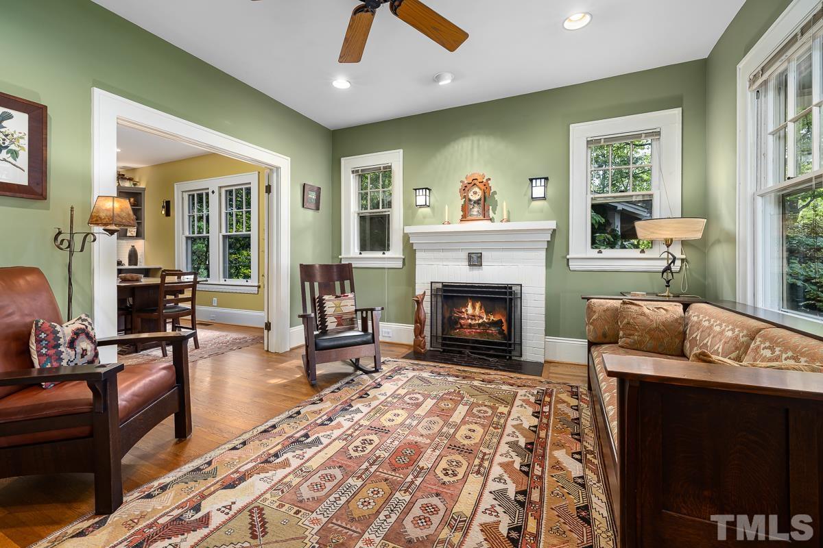 611 North Boundary Street Raleigh, NC 27604 - Photo 6 of 35 a living room with furniture and a fireplace
