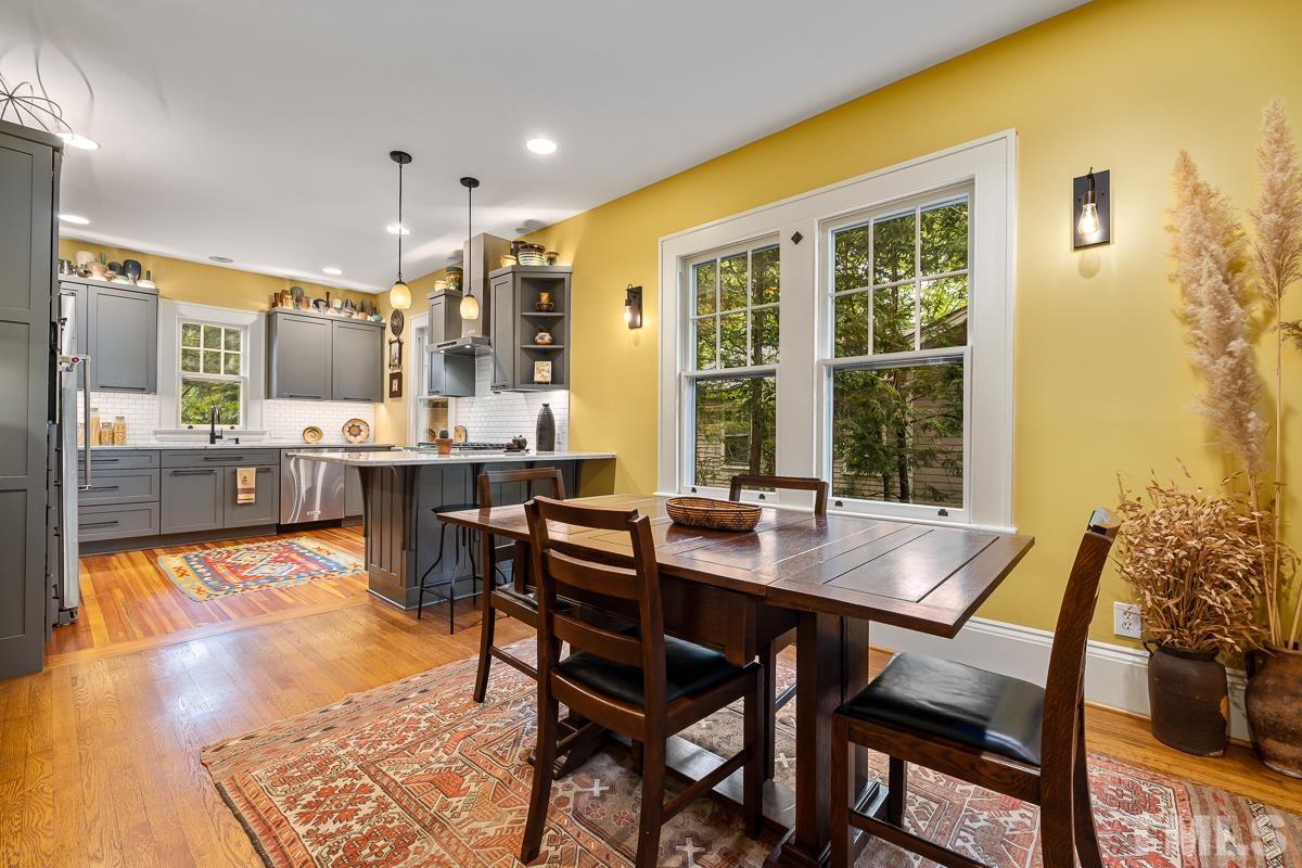 611 North Boundary Street Raleigh, NC 27604 - Photo 8 of 35 a dining room with furniture and wooden floor