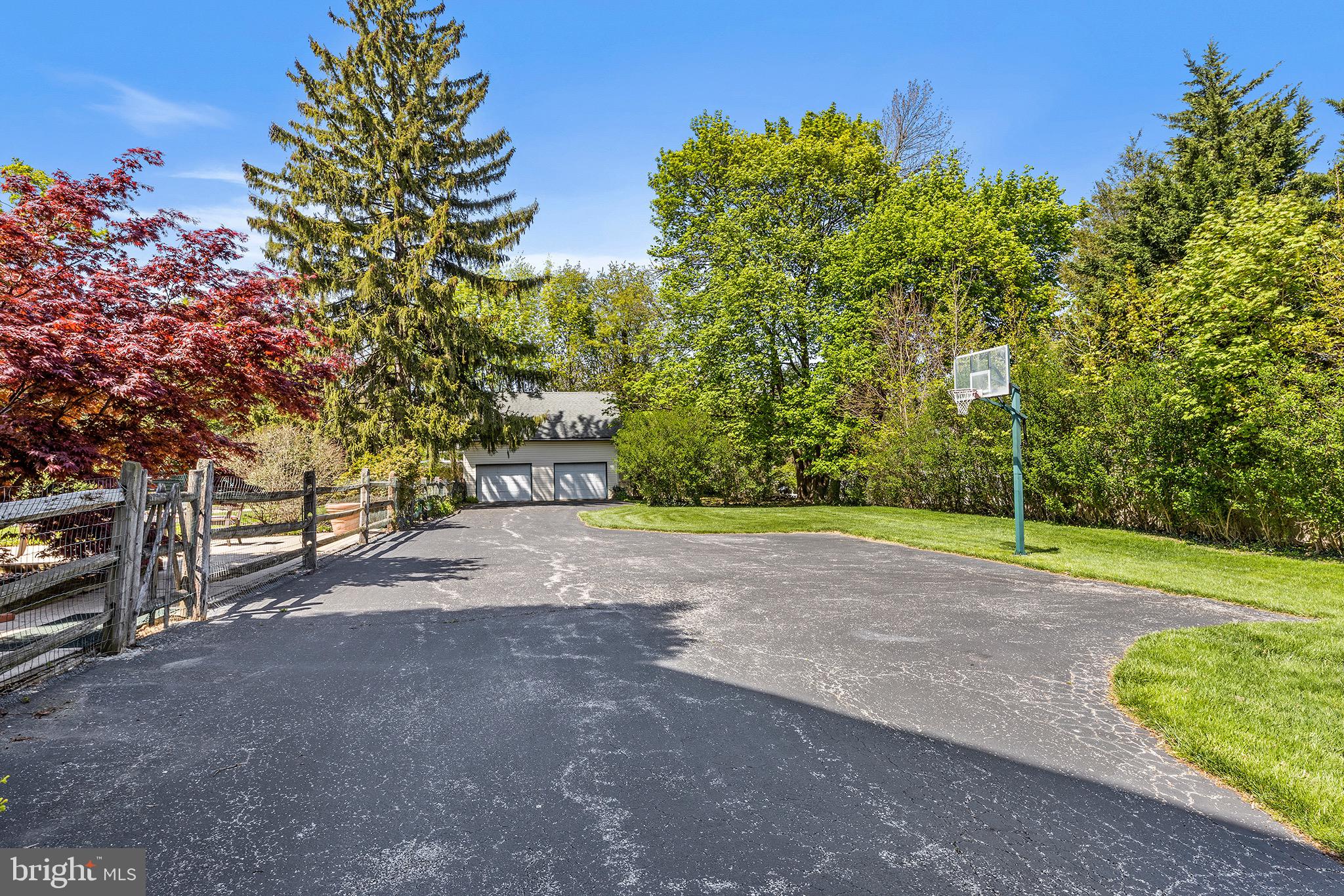 217 Highland Avenue Devon, PA 19333 - Photo 39 of 53 driveway with detached two car garage