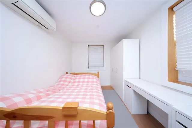 a bathroom with a sink toilet and mirror