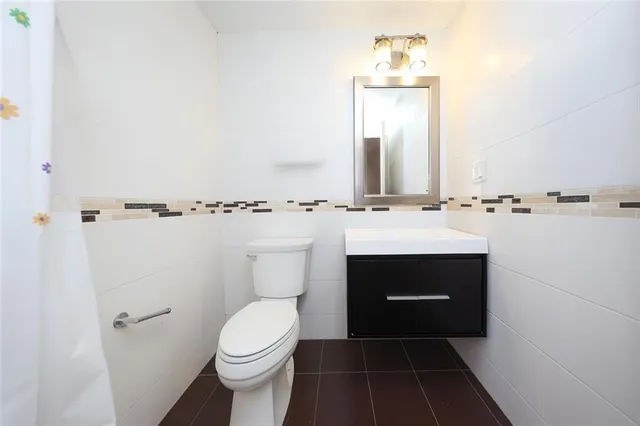 a view of parking garage with cars