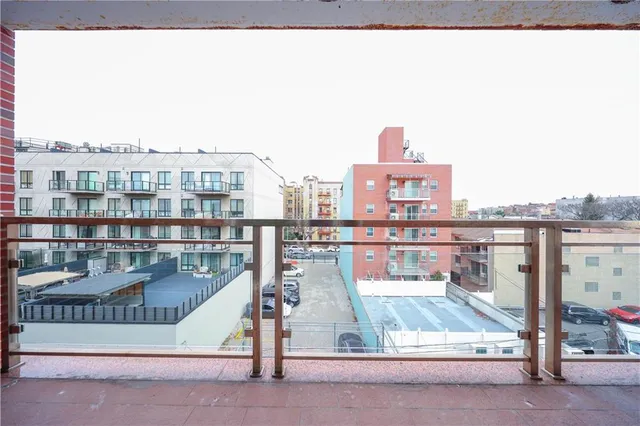 a view of roof deck with city view