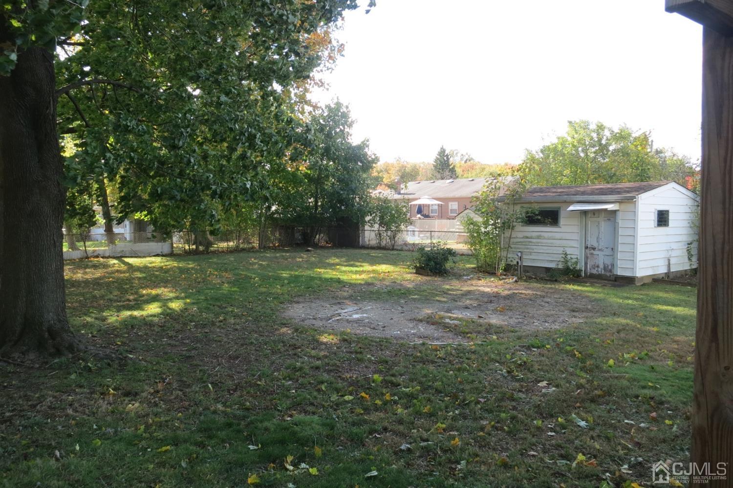 145 Lafayette Road Fords, NJ 08863 - Photo 14 of 18 a view of a house with backyard and sitting area