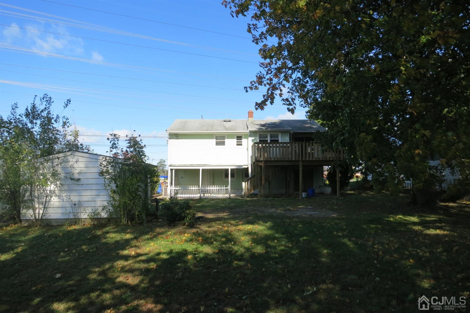 145 Lafayette Road Fords, NJ 08863 - Photo 15 of 18 a front view of a house with garden