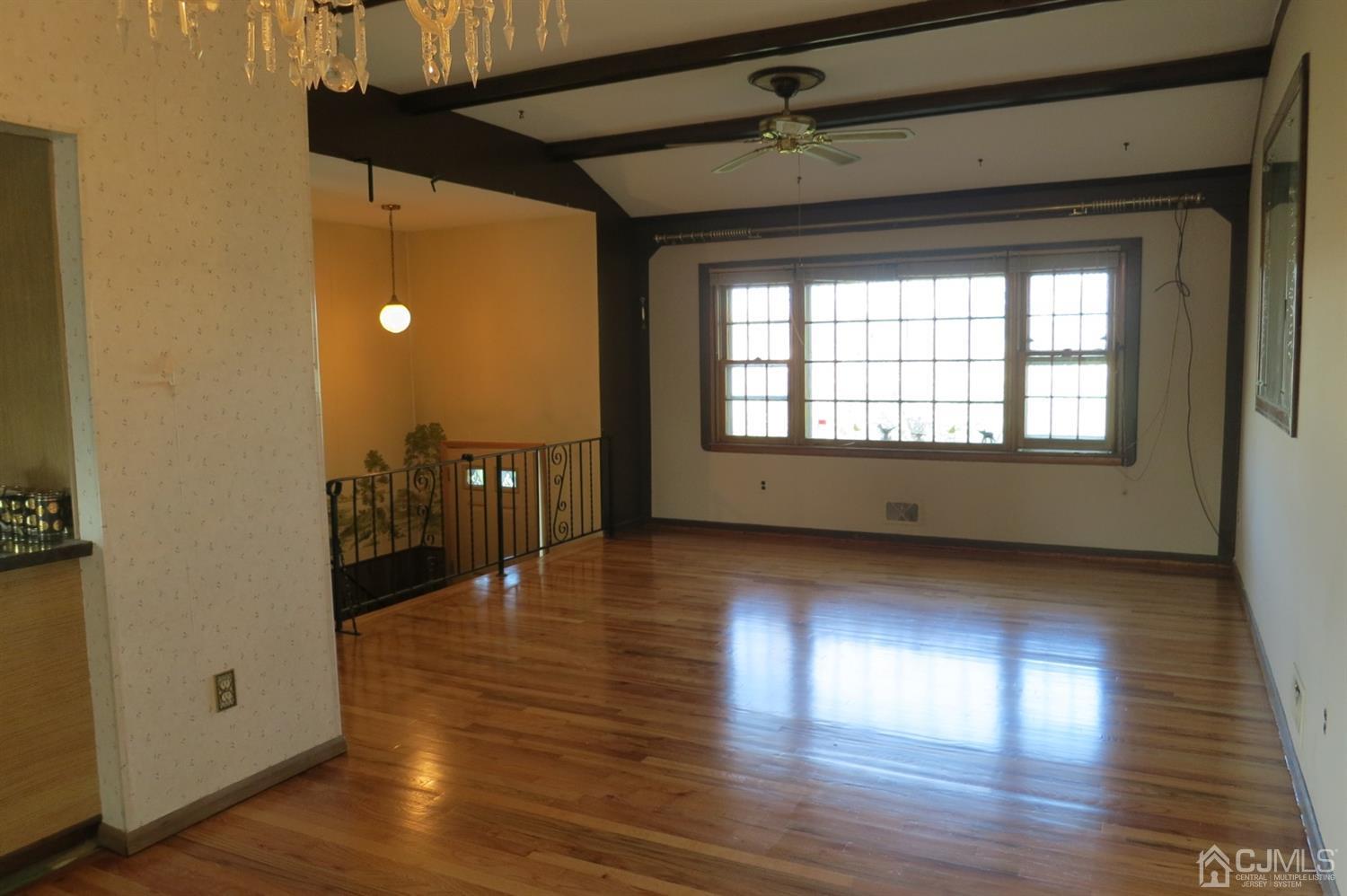 145 Lafayette Road Fords, NJ 08863 - Photo 4 of 18 a view of a livingroom with wooden floor