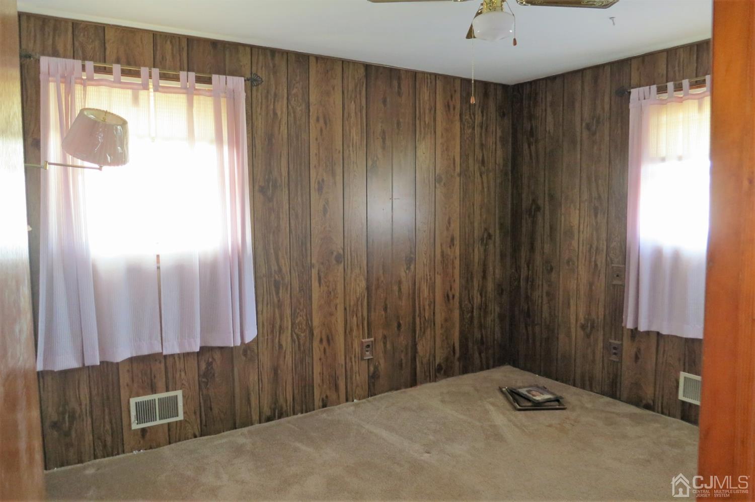 145 Lafayette Road Fords, NJ 08863 - Photo 9 of 18 a view of a closet with wooden floor