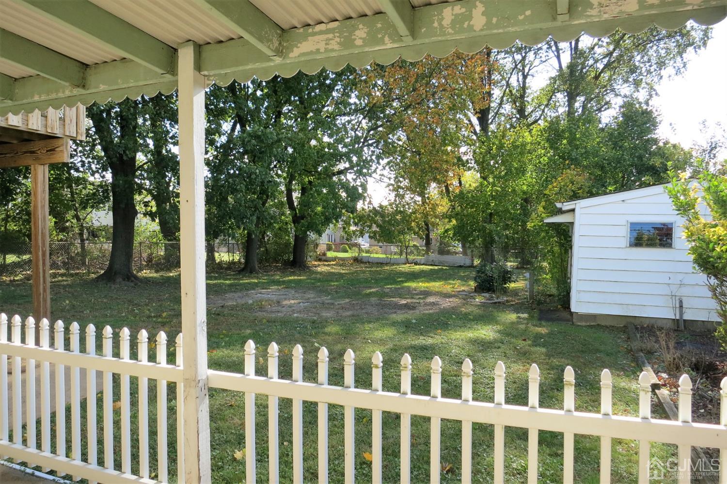 145 Lafayette Road Fords, NJ 08863 - Photo 10 of 18 a view of a wooden house with a yard