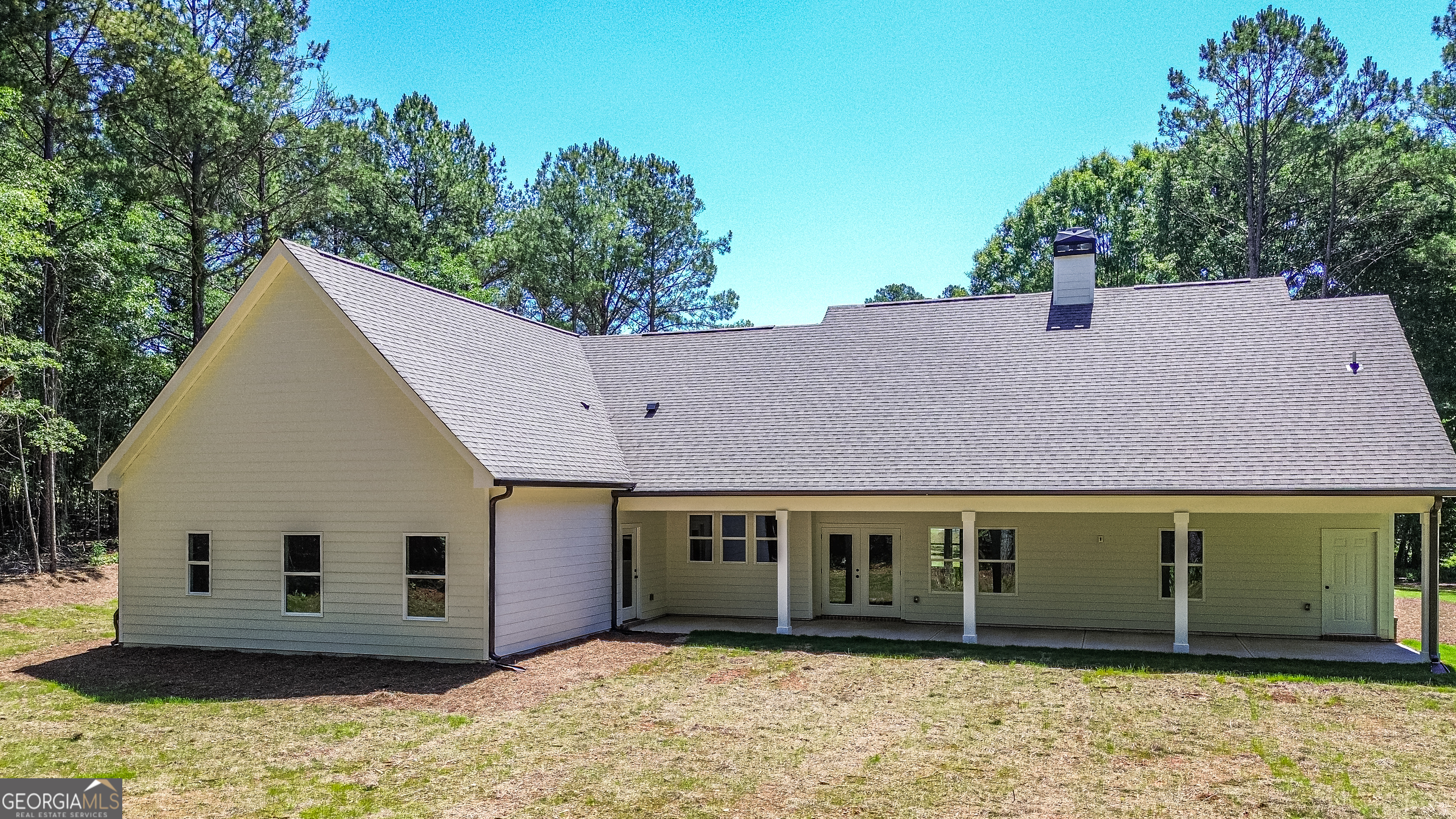 1251 Simmons Road Social Circle, GA 30025 - Photo 6 of 7 a view of a house with a yard