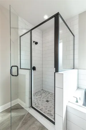 a bathroom with a double vanity sink mirror and double