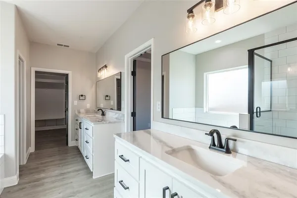 a room with cabinets and sink