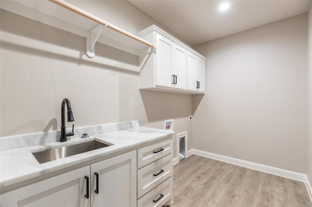 239 Indian Ridge Road Tuscola, TX 79562 - Photo 13 of 37 a room with cabinets and sink