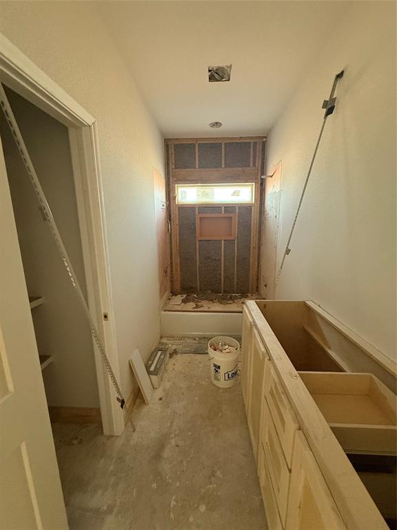 239 Indian Ridge Road Tuscola, TX 79562 - Photo 18 of 24 a bathroom with a granite countertop sink and a tub