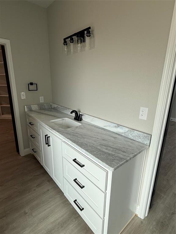 239 Indian Ridge Road Tuscola, TX 79562 - Photo 18 of 26 a view of cabinet and tap