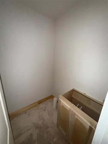 a picture of a bathroom with a shower