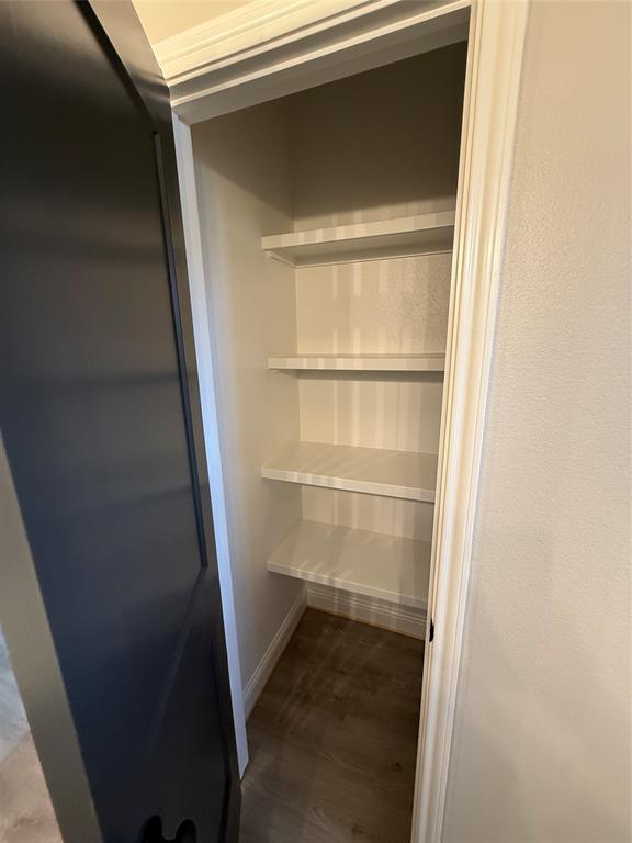 239 Indian Ridge Road Tuscola, TX 79562 - Photo 23 of 26 a view of walk in closet with empty racks