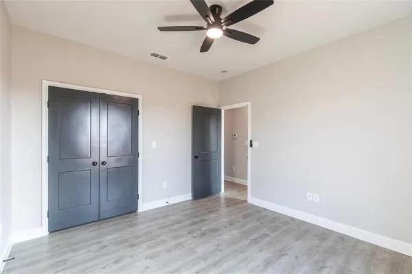 a bathroom with a double vanity sink toilet tub and shower