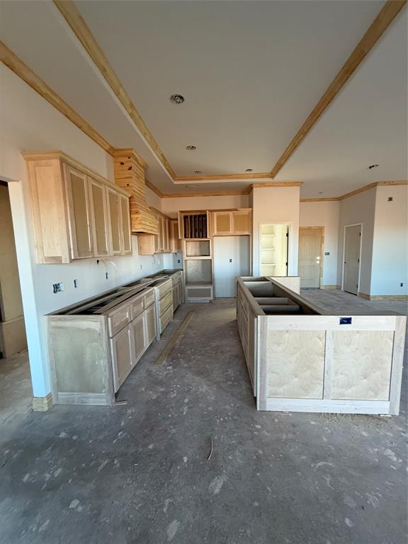 239 Indian Ridge Road Tuscola, TX 79562 - Photo 4 of 24 a kitchen with stainless steel appliances granite countertop a stove and a refrigerator
