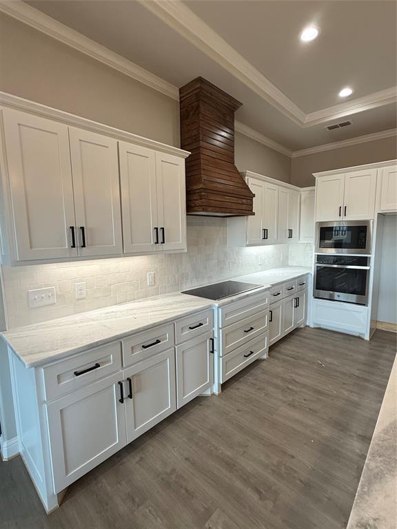 239 Indian Ridge Road Tuscola, TX 79562 - Photo 6 of 26 a kitchen with cabinets and window