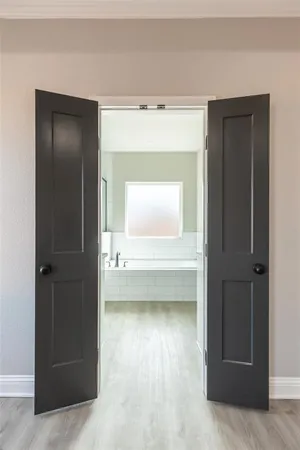 a bathroom with a bathtub and a sink