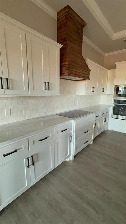 239 Indian Ridge Road Tuscola, TX 79562 - Photo 9 of 26 a kitchen with stainless steel appliances granite countertop white cabinets and a sink