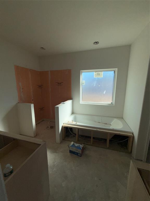 239 Indian Ridge Road Tuscola, TX 79562 - Photo 9 of 24 a room with wooden floor and furniture