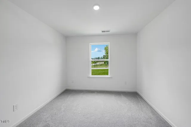 a bathroom with a double vanity sink toilet and shower