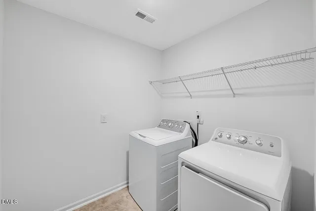 a view of a swimming pool with a yard