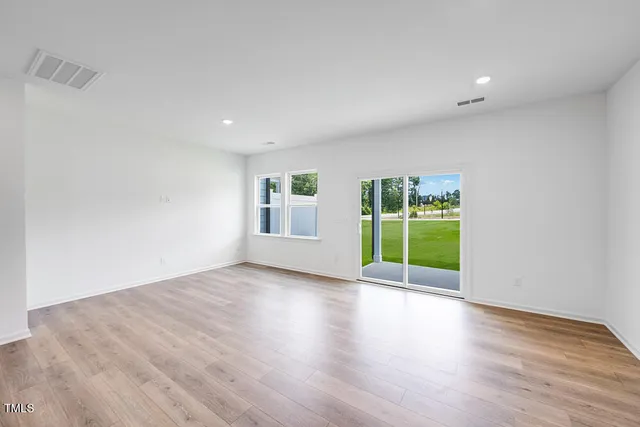 a kitchen with a stove top oven and sink