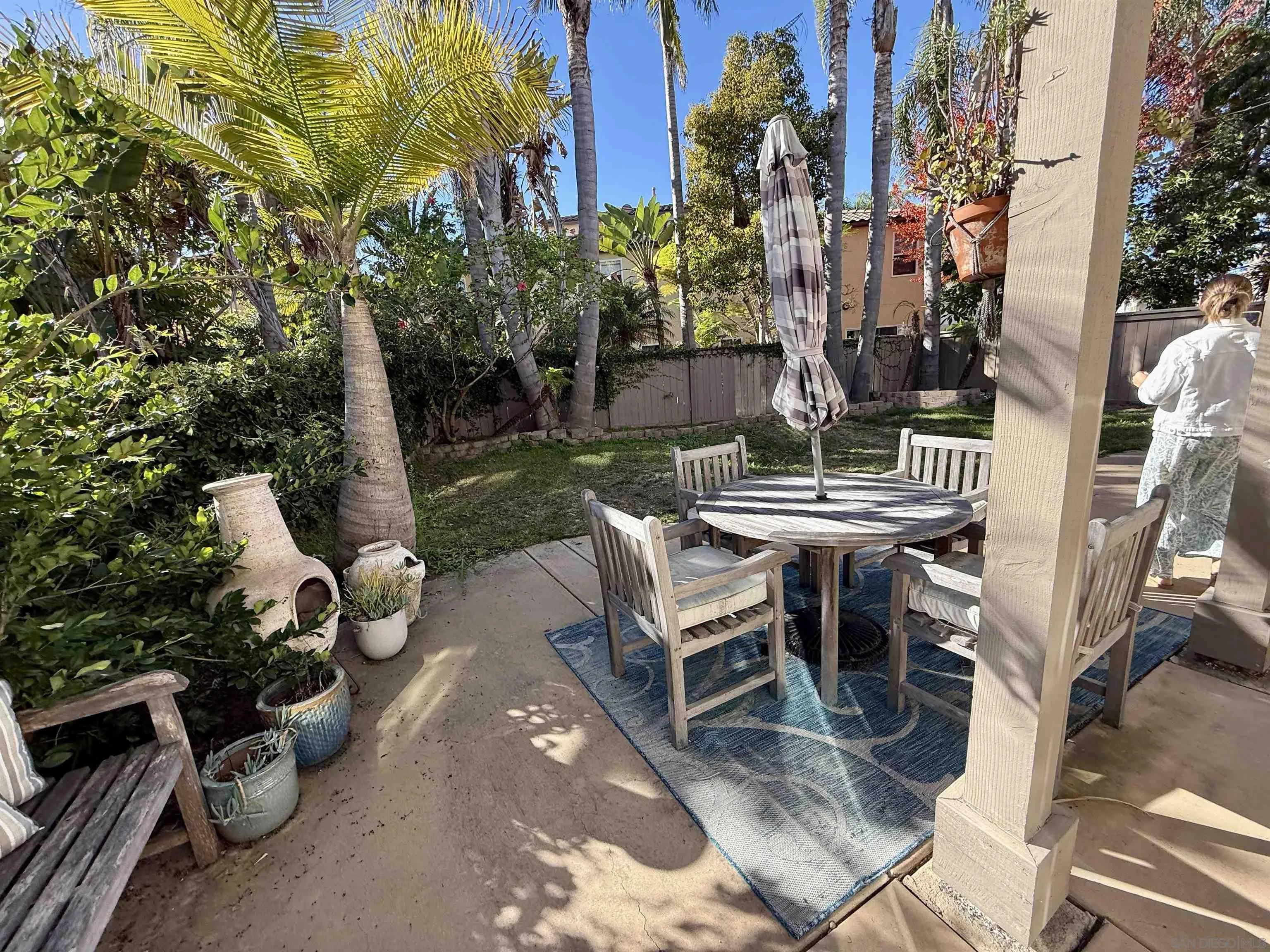 6471 Terraza Portico Carlsbad, CA 92009 - Photo 15 of 19 a view of a tables and chairs in the patio