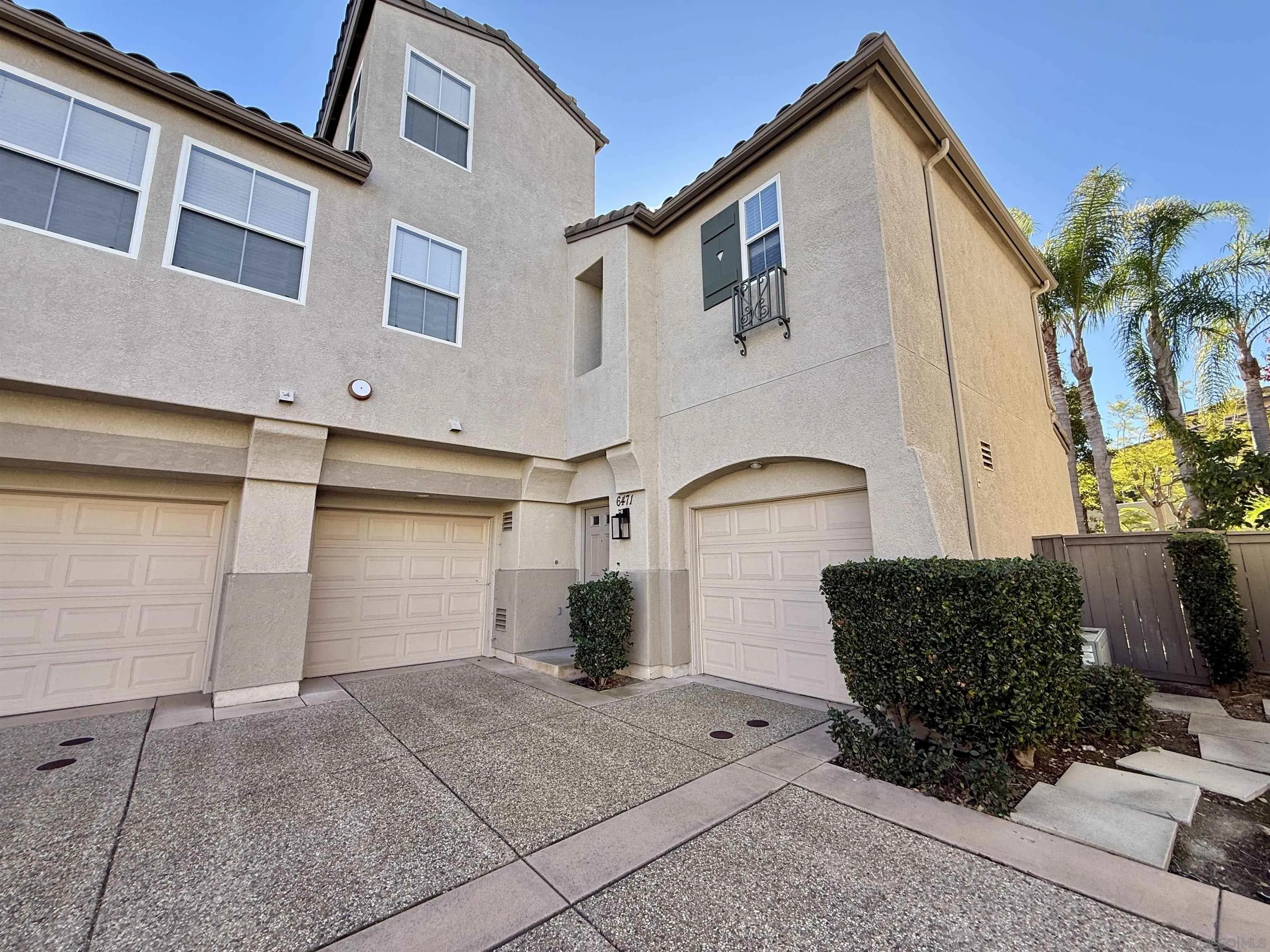 6471 Terraza Portico Carlsbad, CA 92009 - Photo 16 of 19 a front view of a house