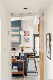 a room with furniture and a window